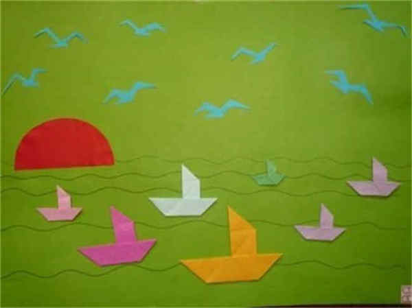 幼儿折纸制作小鱼和小船图解 做成大海纸贴画
