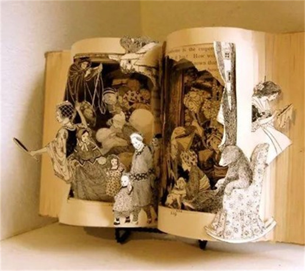 怎么用旧书做纸雕图片 手工制作旧书纸雕作品
