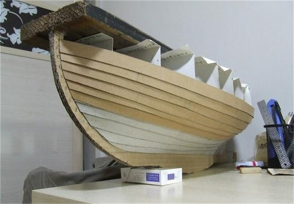 怎么做可以坐人的小船 废纸箱手工制作载人船