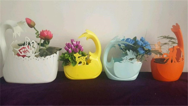 洗衣液瓶做花盆图片 洗衣液瓶子DIY花盆教程
